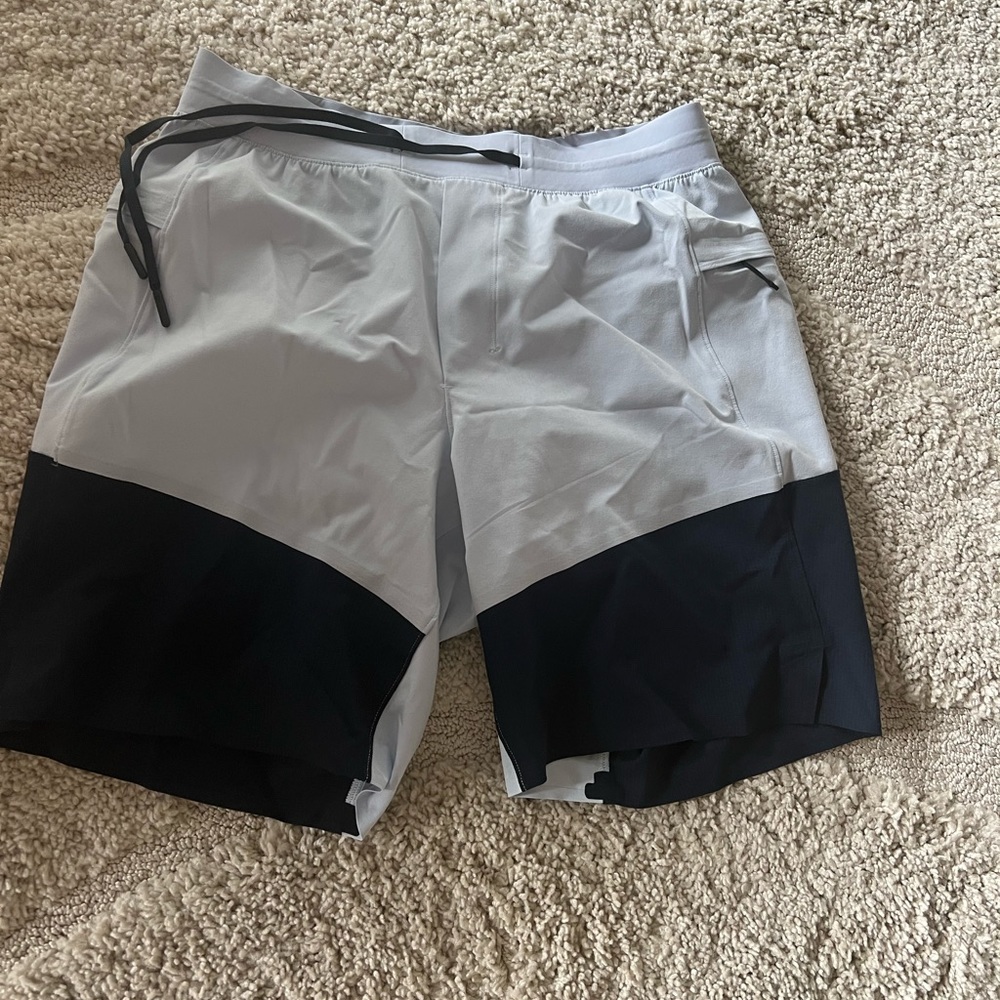 Light blue and navy lululemon swim trunks medium
